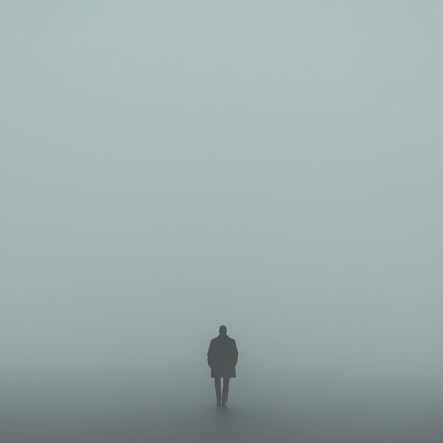 Lone figure in a long coat walking into thick grey-green fog